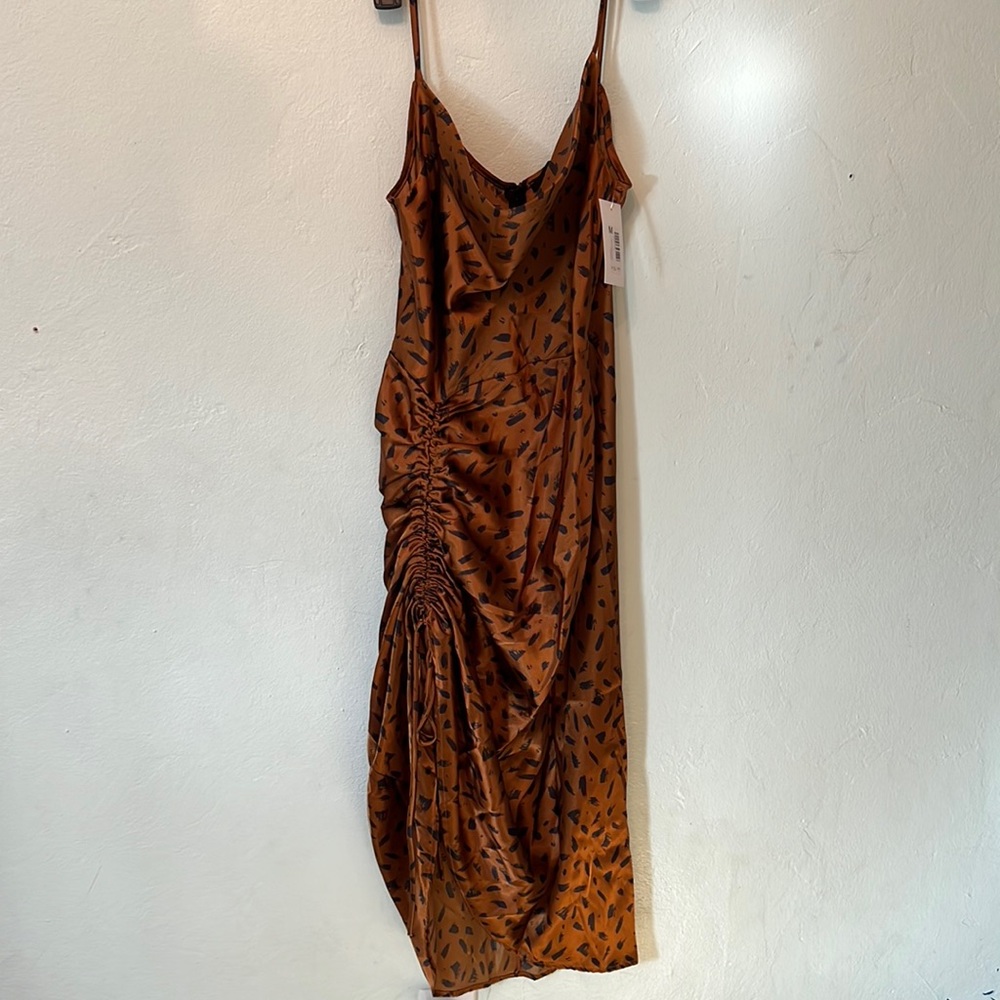 Midi length dress with adjustable side